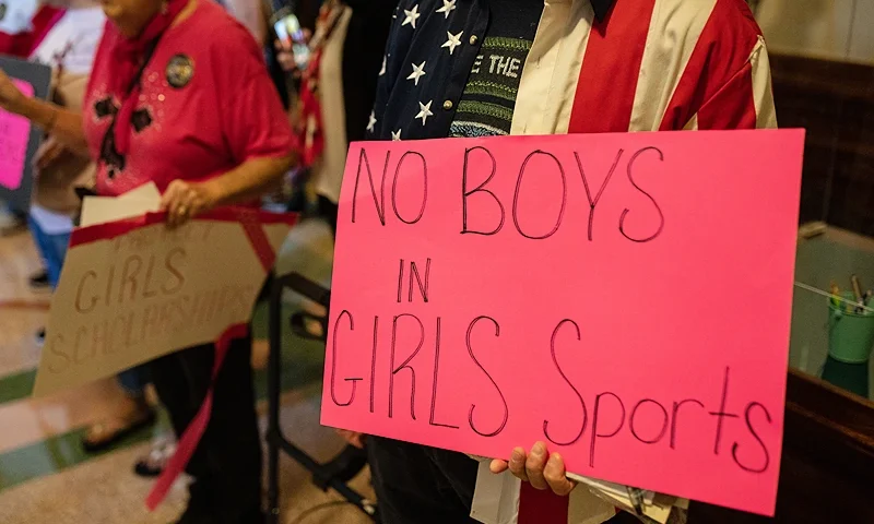 AUSTIN, TX - SEPTEMBER 20: Demonstrators supporting restrictions on transgender student athletes are gathered at the Texas State Capitol on the first day of the 87th Legislature's third special session on September 20, 2021 in Austin, Texas. Following a second special session that saw the passage of controversial voting and abortion laws, Texas lawmakers have convened at the Capitol for a third special session to address more of Republican Gov. Greg Abbott's conservative priorities which include redistricting, the distribution of federal COVID-19 relief funds, vaccine mandates and restrictions on how transgender student athletes can compete in sports. (Photo by Tamir Kalifa/Getty Images)