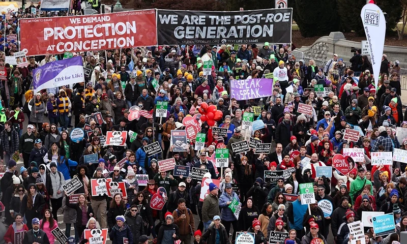 WASHINGTON, DC - JANUARY 20: People attend the 50th annual March for Life rally on the National Mall on January 20, 2023 in Washington, DC. Anti-abortion activists attended the annual march to mark the first to occur in a “post-Roe nation” since the Supreme Court's Dobbs vs Jackson Women's Health ruling which overturned 50 years of federal protections for abortion healthcare. (Photo by Kevin Dietsch/Getty Images)