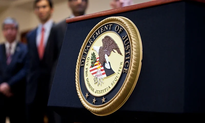 NEW YORK, NY - DECEMBER 11: A US Department of Justice seal is displayed on a podium during a news conference to announce money laundering charges against HSBC on December 11, 2012 in the Brooklyn borough of New York City. HSBC Holdings plc and HSBC USA NA have agreed to pay $1.92 billion and enter into a deferred prosecution agreement with the U.S. Department of Justice in regards to charges involving money laundering with Mexican drug cartels. (Photo by Ramin Talaie/Getty Images)