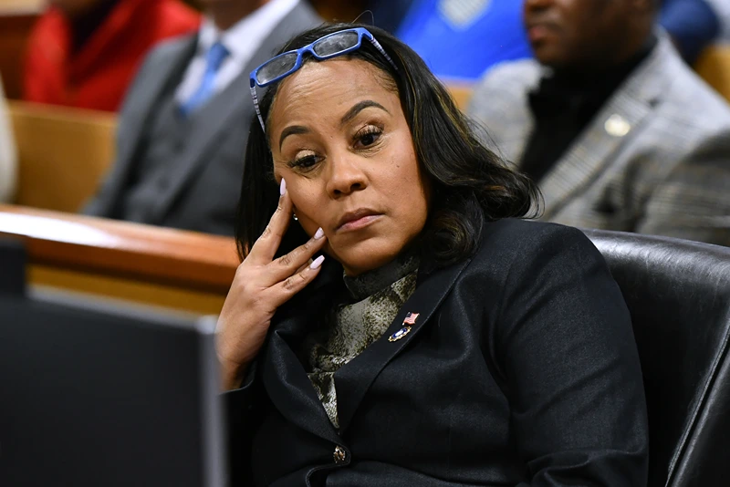 Harrison Floyd Appears For Hearing In Georgia Election Interference Case
ATLANTA, GEORGIA - NOVEMBER 21: Fulton County District Attorney Fani Willis appears before Judge Scott McAfee for a hearing in the 2020 Georgia election interference case at the Fulton County Courthouse on November 21, 2023 in Atlanta, Georgia. Judge McAfee heard arguments as to whether co-defendant Harrison Floyd should be sent to jail for social media posts and comments that potentially targeted witnesses in the trial. McAfee declined to revoke Floyd's bond. Floyd was charged along with former US President Donald Trump and 17 others in an indictment that accuses them of illegally conspiring to subvert the will of Georgia voters in the 2020 presidential election. (Photo by Dennis Byron-Pool/Getty Images)