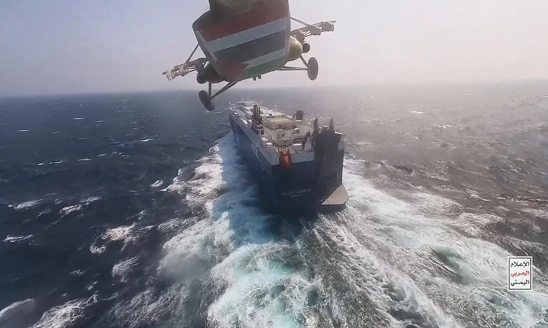 INTERNATIONAL WATERS RED SEA, YEMEN - NOVEMBER 20: This handout screen grab captured from a video shows Yemen's Houthi fighters' takeover of the Galaxy Leader Cargo in the Red Sea coast off Hudaydah, on November 20, 2023 in the Red Sea, Yemen. On Monday, the Houthi movement in Yemen released footage and photos of the Houthi-run coastguard taking over the Israeli-linked Galaxy Leader Vessel in the Red Sea, which had 52 people onboard. Galaxy Leader is owned by Galaxy Maritime Ltd in the Isle of Man and is linked to Israeli businessman Abraham Ungar through Ray Car Carriers. (Photo by Houthi Movement via Getty Images)