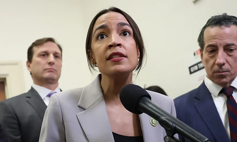 WASHINGTON, DC - DECEMBER 13: House Oversight and Accountability Committee member Rep. Alexandria Ocasio-Cortez (D-NY) speaks to reporters as she is joined by fellow House Democrats in the Rayburn House Office Building on December 13, 2023 in Washington, DC. U.S. President Joe Biden's son Hunter Biden defied a subpoena from Congress to testify behind closed doors ahead of a House vote on an impeachment inquiry against his father. (Photo by Kevin Dietsch/Getty Images)