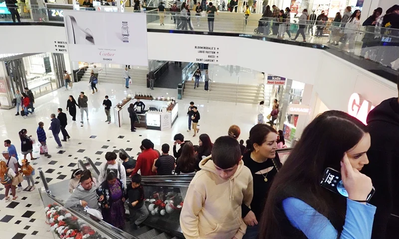 Retail Sales Rises 3.1% During Holiday Shopping Season GLENDALE, CALIFORNIA - DECEMBER 26: People gather in the Glendale Galleria shopping mall on the day after Christmas on December 26, 2023 in Glendale, California. U.S. retail sales rose 3.1 percent year over year this holiday season, based on in-store and online purchases, according to Mastercard SpendingPulse. (Photo by Mario Tama/Getty Images)