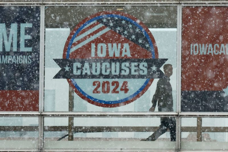 DES MOINES, IOWA - JANUARY 08: Heavy snow falls as a man walks along the Skywalk system that connects buildings in downtown on January 08, 2024 in Des Moines, Iowa. Wintery weather forced Republican presidential candidates Nikki Haley and Vivek Ramaswamy to cancel campaign events in Iowa one week before the caucuses, the first Republican Party primary contest of the 2024 presidential election. (Photo by Chip Somodevilla/Getty Images)