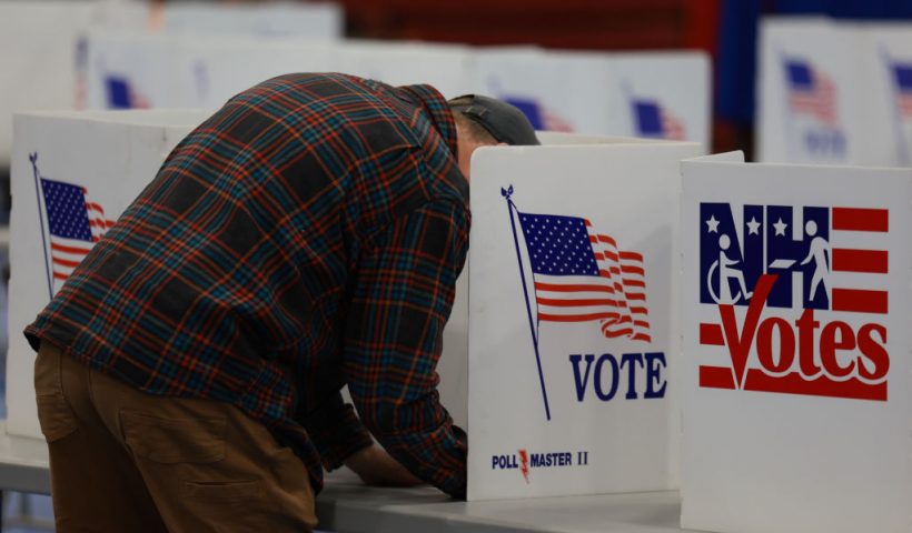 BEDFORD, NEW HAMPSHIRE - JANUARY 23: A voter fills out their ballot at a polling location at Bedford High School on January 23, 2024 in Bedford, New Hampshire. Voters headed to the polls as New Hampshire holds its primary. (Photo by Joe Raedle/Getty Images)