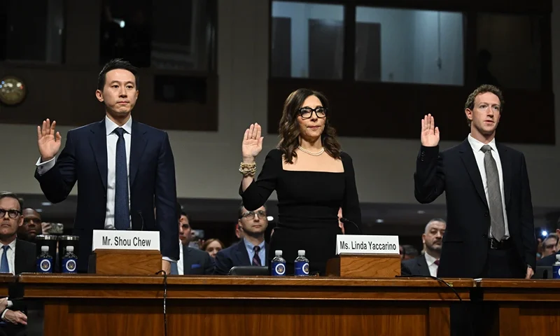 US-TECHNOLOGY-INTERNET-CHILD-EXPLOITATION (L-R) Shou Zi Chew, CEO of TikTok; Linda Yaccarino, CEO of X; and Mark Zuckerberg, CEO of Meta, are sworn in during the US Senate Judiciary Committee hearing, "Big Tech and the Online Child Sexual Exploitation Crisis," in Washington, DC, on January 31, 2024. (Photo by ANDREW CABALLERO-REYNOLDS / AFP) (Photo by ANDREW CABALLERO-REYNOLDS/AFP via Getty Images)