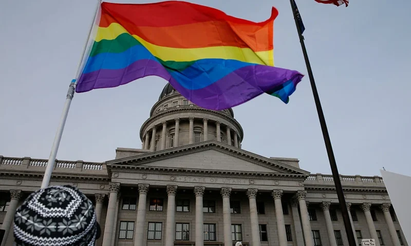 SLAT LAKE CITY, UT - JANUARY 28: Supporters hold a pro-gay marriage rally outside the Utah State Capitol on January 28, 2014 in Salt Lake City, Utah. Several weeks ago a federal judge ruled unconstitutional a voter-approved ban on same-sex marriage in the state of Utah. The ruling has since been stayed and is working it's way through the legal system. (Photo by George Frey/Getty Images)