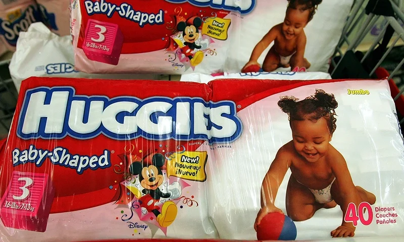 CHICAGO - APRIL 27: Kimberly-Clark-brand Huggies diapers sit in a shopping cart in a grocery store April 27, 2005 in Chicago, Illinois. The price of diapers is set to rise this summer as manufacturers pass on higher production costs including such unique diaper materials as adhesives and super absorbents. (Photo by Tim Boyle/Getty Images)