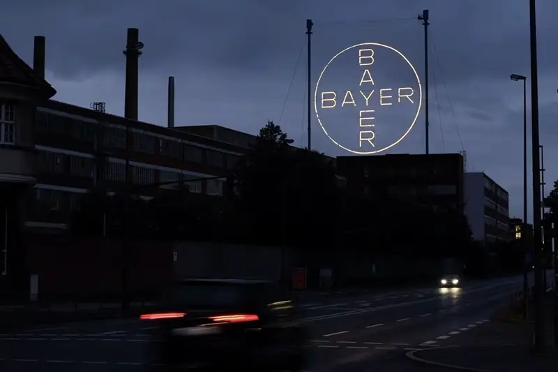 The 120 metres high Bayer Cross, logo of German pharmaceutical and chemical maker Bayer AG, consisting of 1710 LED glass bulbs is seen outside the industrial park "Chempark" of the chemical industry in Leverkusen, Germany, September 23, 2023. REUTERS/Wolfgang Rattay/File Photo