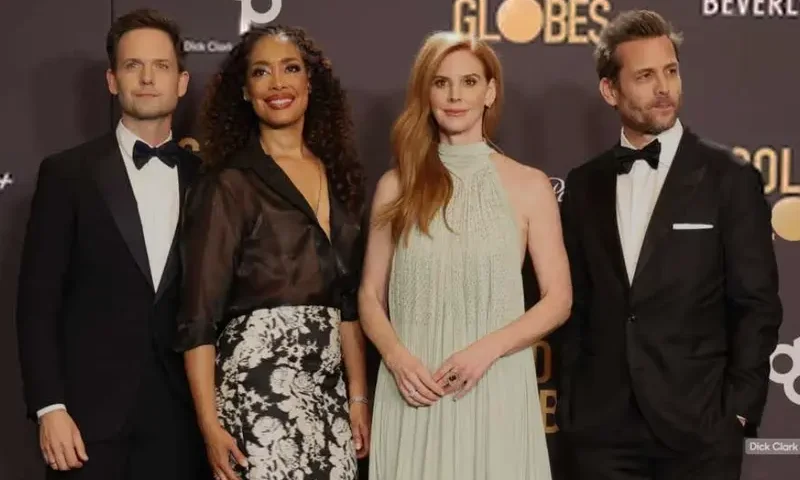 Gabriel Macht, Sarah Rafferty, Gina Torres and Patrick J. Adams pose at the 81st Annual Golden Globe Awards in Beverly Hills, California, U.S., January 7, 2024. REUTERS/Mario Anzuoni/File photo