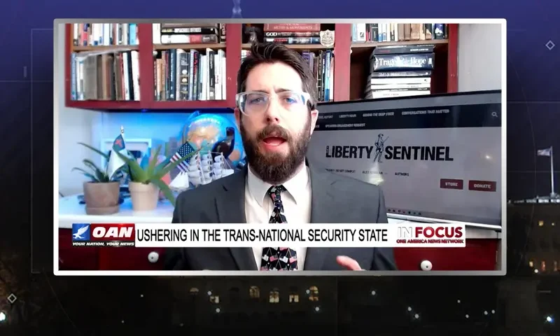 Video still from In Focus on One America News Network during an interview with the guest, Alex Newman.