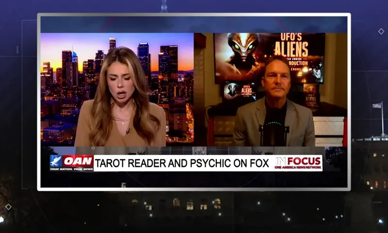 Video still from In Focus on One America News Network showing a split screen of the host on the left side, and on the right side is the guest, Pastor Billy Crone.