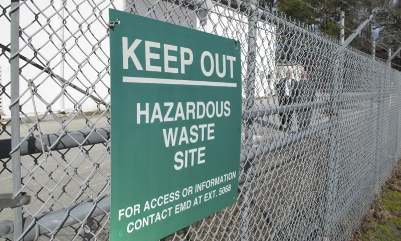 2 of 2 | FILE-In a Feb. 27, 2013 file photo, a sign cautions visitors outside a "pump and treat" facility on the Marine base at Camp Lejeune, N.C. Military personnel stationed at Camp Lejeune from 1975 to 1985 had at least a 20% higher risk for a number of cancers than those stationed elsewhere, federal health officials said Wednesday, Jan. 31, 2024, in a long-awaited study of the North Carolina base's contaminated drinking water. (AP Photo/Allen Breed, File)