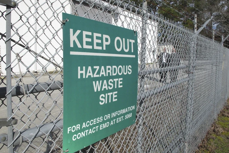 2 of 2 | FILE-In a Feb. 27, 2013 file photo, a sign cautions visitors outside a "pump and treat" facility on the Marine base at Camp Lejeune, N.C. Military personnel stationed at Camp Lejeune from 1975 to 1985 had at least a 20% higher risk for a number of cancers than those stationed elsewhere, federal health officials said Wednesday, Jan. 31, 2024, in a long-awaited study of the North Carolina base's contaminated drinking water. (AP Photo/Allen Breed, File)