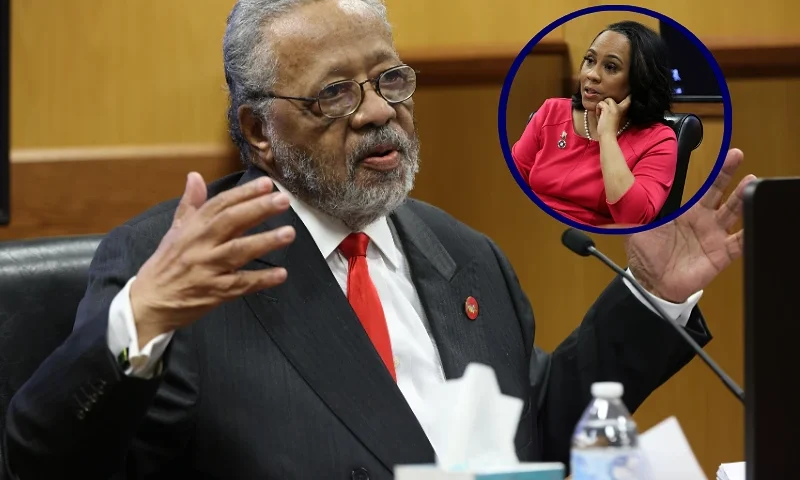 ATLANTA, GA - FEBRUARY 16: John Floyd III, father of Fulton District Attorney Fani Willis, speaks at the witness stand during a hearing in the case of the State of Georgia v. Donald John Trump at the Fulton County Courthouse on February 16, 2024 in Atlanta, Georgia. Judge Scott McAfee is hearing testimony as to whether DA Fani Willis and Special Prosecutor Nathan Wade should be disqualified from the case for allegedly lying about a personal relationship. (Photo by Alyssa Pointer-Pool/Getty Images)