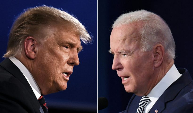 TOPSHOT - (COMBO) This combination of pictures created on September 29, 2020 shows US President Donald Trump (L) and Democratic Presidential candidate former Vice President Joe Biden squaring off during the first presidential debate at the Case Western Reserve University and Cleveland Clinic in Cleveland, Ohio on September 29, 2020. (Photo by JIM WATSON and SAUL LOEB / AFP) (Photo by JIM WATSONSAUL LOEB/AFP via Getty Images)