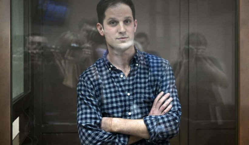TOPSHOT - US journalist Evan Gershkovich, arrested on espionage charges, stands inside a defendants' cage before a hearing to consider an appeal on his arrest at the Moscow City Court in Moscow on April 18, 2023. (Photo by NATALIA KOLESNIKOVA / AFP) (Photo by NATALIA KOLESNIKOVA/AFP via Getty Images)
