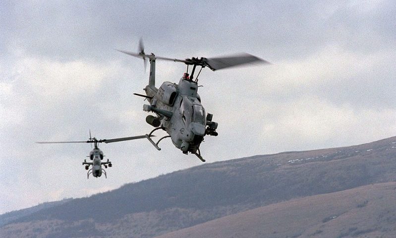 BOSNIA - APRIL 2: (FILE PHOTO) This handout photo from the U.S. Department of Defense shows two U.S. Marine AH-1W Super Cobra helicopters from the 26th Marine Expeditionary Unit training on April 2, 1998 in Bosnia. According to media reports, two Marine helicopters of this type crashed on January 22, 2003 near Zapata, Texas. Reports say that the aircraft were conducting a night time-time operation in conjunction with the U.S. Border Patrol in a drug smuggling case the agency was working on. All four Marines onboard the two helicopters were killed. (Photo by Steve Briggs/U.S. Navy/Getty Images)