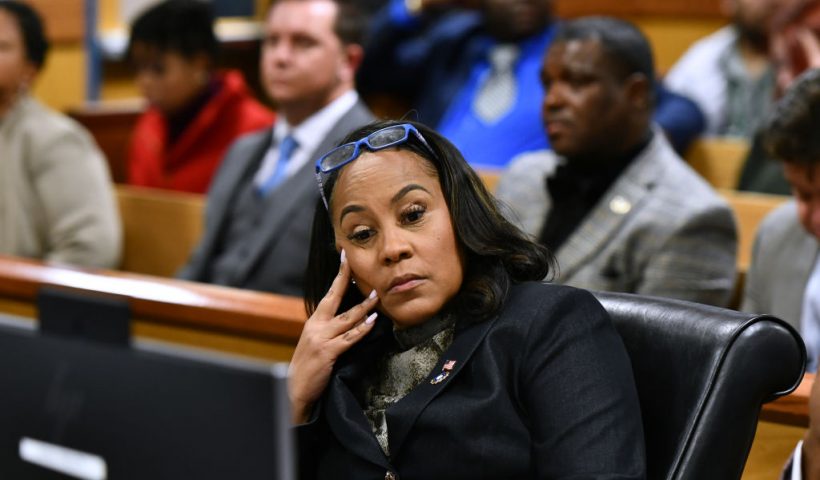ATLANTA, GEORGIA - NOVEMBER 21: Fulton County District Attorney Fani Willis appears before Judge Scott McAfee for a hearing in the 2020 Georgia election interference case at the Fulton County Courthouse on November 21, 2023 in Atlanta, Georgia. Judge McAfee heard arguments as to whether co-defendant Harrison Floyd should be sent to jail for social media posts and comments that potentially targeted witnesses in the trial. McAfee declined to revoke Floyd's bond. Floyd was charged along with former US President Donald Trump and 17 others in an indictment that accuses them of illegally conspiring to subvert the will of Georgia voters in the 2020 presidential election. (Photo by Dennis Byron-Pool/Getty Images)