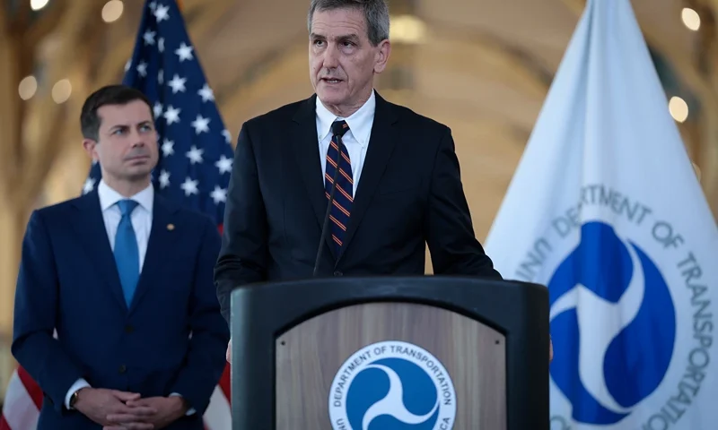 Transportation Secretary Buttigieg Holds A Press Conference On Holiday Air Travel ARLINGTON, VIRGINIA - DECEMBER 19: FAA Administrator Mike Whitaker (R) and U.S. Transportation Secretary Pete Buttigieg (L) speaks during a news conference at Ronald Reagan National Airport December 19, 2023 in Arlington, Virginia. Buttigieg and Whitaker spoke on the upcoming holiday air travel period and also the recent $140 million fine levied against Southwest Airlines for delays and cancellations during the 2022 holiday travel period. (Photo by Win McNamee/Getty Images)