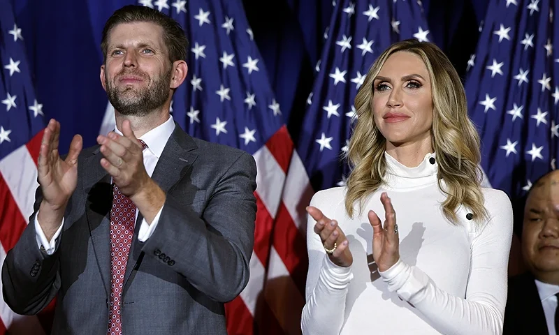 NASHUA, NEW HAMPSHIRE - JANUARY 23: Eric Trump (L) and his wife, Lara Trump, applaud for Republican presidential candidate and former U.S. President Donald Trump, during a primary night party at the Sheraton on January 23, 2024, in Nashua, New Hampshire. New Hampshire voters cast their ballots in their state’s primary election today. Former President Donald Trump won the primary, finishing ahead of former UN Ambassador Nikki Haley. (Photo by Chip Somodevilla/Getty Images)