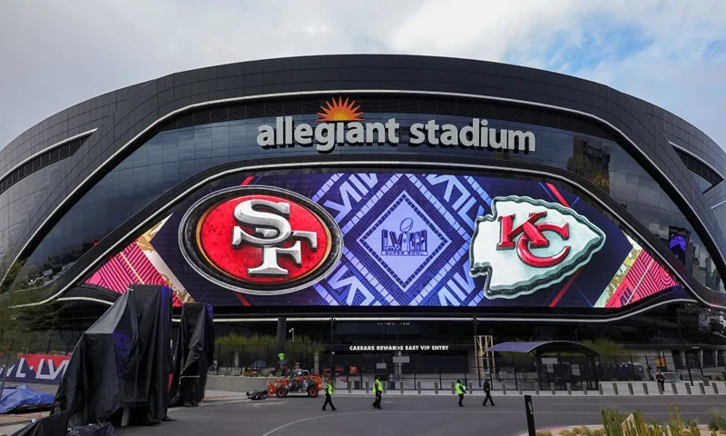 LAS VEGAS, NEVADA - FEBRUARY 01: A video board displays logos for Super Bowl LVIII at Allegiant Stadium on February 01, 2024 in Las Vegas, Nevada. The game will be played on February 11, 2024, between the Kansas City Chiefs and the San Francisco 49ers. (Photo by Ethan Miller/Getty Images)