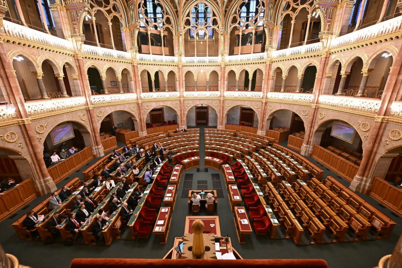 A general view taken on February 5, 2024 shows empty seats (C and R) in the plenary hall of the Hungarian Parliament in Budapest during an extraordinary sitting at the opposition's request to debate Sweden's NATO bid. Representatives of the governing FIDESZ party led by Hungarian Prime Minister Orban and the right-wing Christian Democratic party stayed away from today's session. Budapest remains the last holdout to ratify the Nordic country's bid to join the military alliance, following Turkey's ratification in January. (Photo by ATTILA KISBENEDEK / AFP) (Photo by ATTILA KISBENEDEK/AFP via Getty Images)