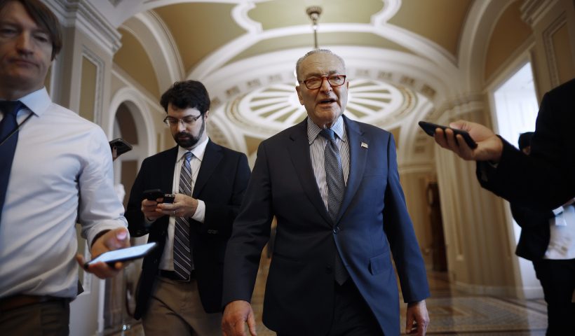 WASHINGTON, DC - FEBRUARY 07: Senate Majority Leader Charles Schumer (D-NY) talks to reporters as he walks to his office at the U.S. Capitol on February 07, 2024 in Washington, DC. In the immediate wake of the failed bipartisan border security and foreign aid legislation, Schumer said he will put up a supplemental spending bill for aid to Israel, Ukraine, and Taiwan up for a vote later on Wednesday. (Photo by Chip Somodevilla/Getty Images)