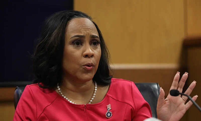 ATLANTA, GA - FEBRUARY 15: Fulton County District Attorney Fani Willis testifies during a hearing in the case of the State of Georgia v. Donald John Trump at the Fulton County Courthouse on February 15, 2024 in Atlanta, Georgia. Judge Scott McAfee is hearing testimony as to whether Willis and Special Prosecutor Nathan Wade should be disqualified from the case for allegedly lying about a personal relationship. (Photo by Alyssa Pointer-Pool/Getty Images)