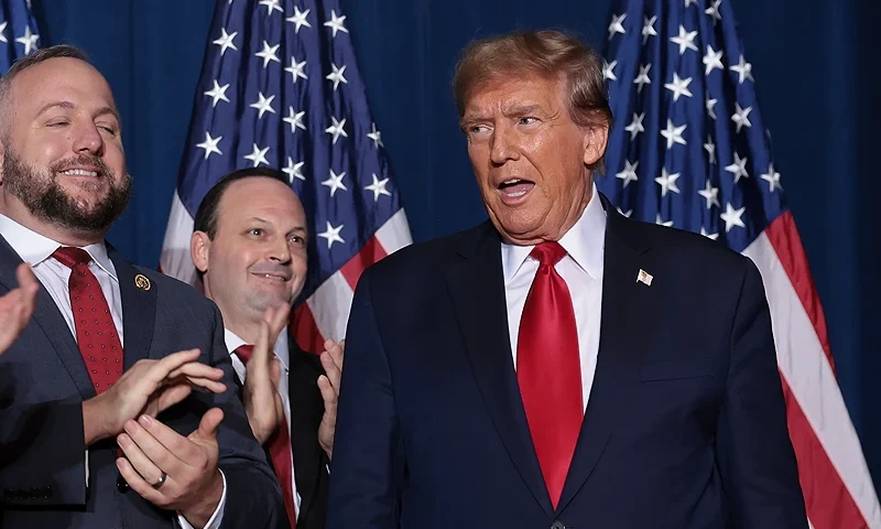 COLUMBIA, SOUTH CAROLINA - FEBRUARY 24: Republican presidential candidate and former President Donald Trump arrives on stage to speak to supporters during an election night watch party at the State Fairgrounds on February 24, 2024 in Columbia, South Carolina. Trump defeated Republican presidential candidate former U.N. Ambassador Nikki Haley in her home state as South Carolina held its primary today. Also pictured is Sen. Lindsey Graham (L) (R-SC) (Photo by Win McNamee/Getty Images)