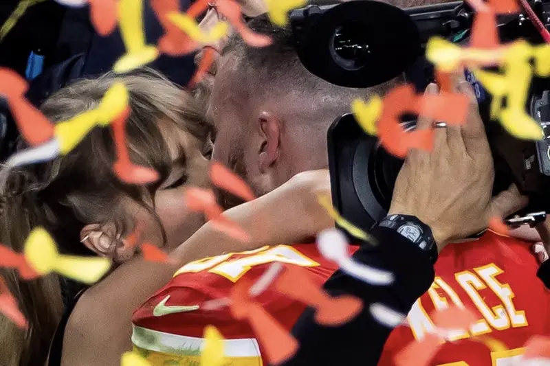 Kansas City Chiefs' Travis Kelce kisses partner Taylor Swift as they celebrate after Kansas City Chiefs win Super Bowl LVIII REUTERS/Carlos Barria