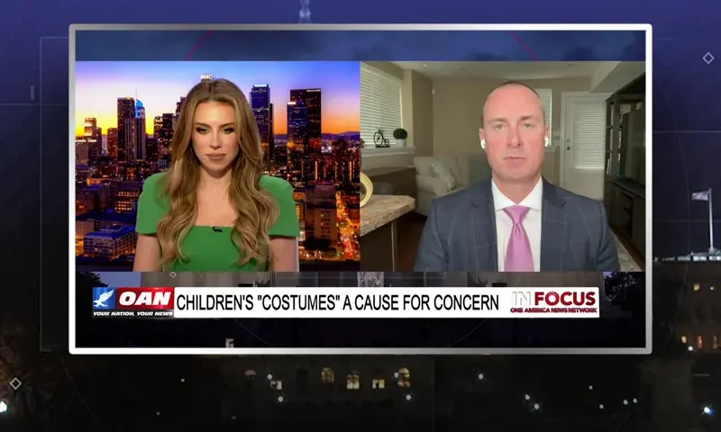 Video still from In Focus on One America News Network showing a split screen of the host on the left side, and on the right side is the guest, Chris Elston.