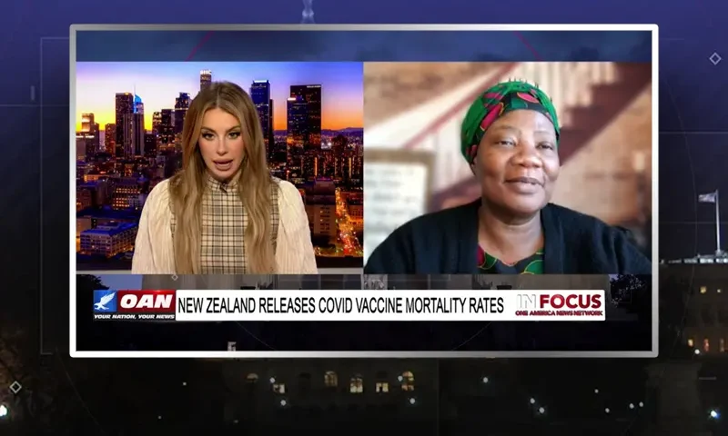 Video still from In Focus on One America News Network showing a split screen of the host on the left side, and on the right side is the guest, Dr. Stella Immanuel.