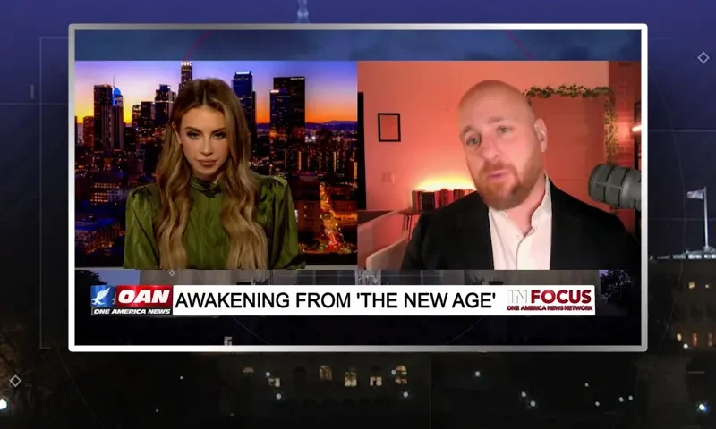 Video still from In Focus on One America News Network showing a split screen of the host on the left side, and on the right side is the guest, Will Spencer.
