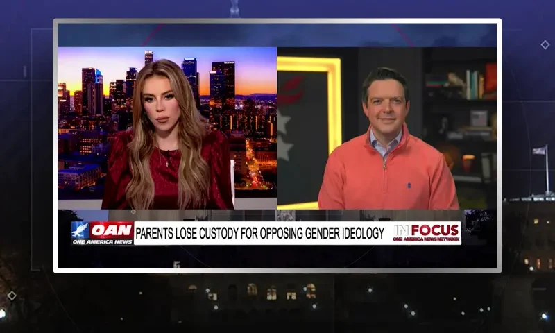 Video still from In Focus on One America News Network showing a split screen of the host on the left side, and on the right side is the guest, Ryan Helfenbein.
