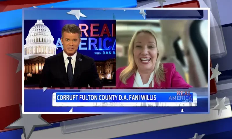 Video still from Real America on One America News Network showing a split screen of the host on the left side, and on the right side is the guest, Mallory Staples.