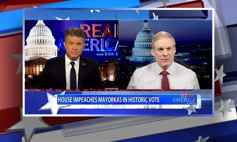 Video still from Real America on One America News Network showing a split screen of the host on the left side, and on the right side is the guest, Rep. Jim Jordan.