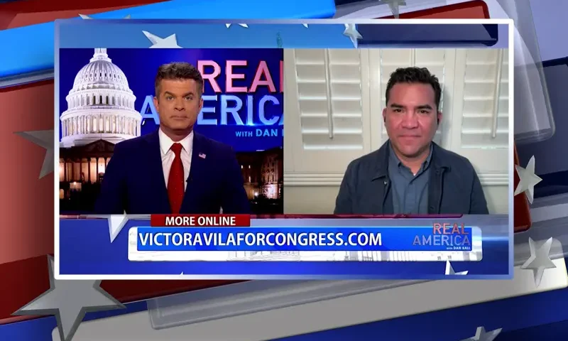 Video still from Real America on One America News Network showing a split screen of the host on the left side, and on the right side is the guest, Victor Avila.