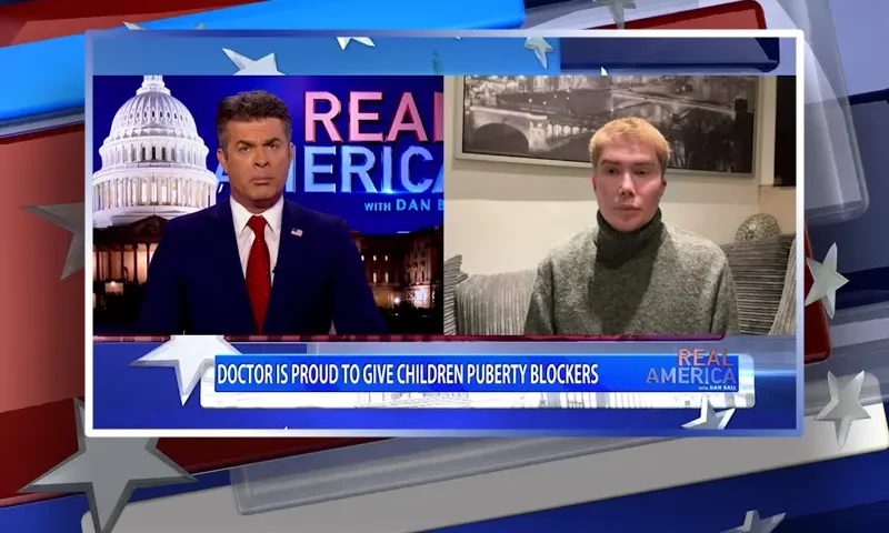 Video still from Real America on One America News Network showing a split screen of the host on the left side, and on the right side is the guest, Oli London.