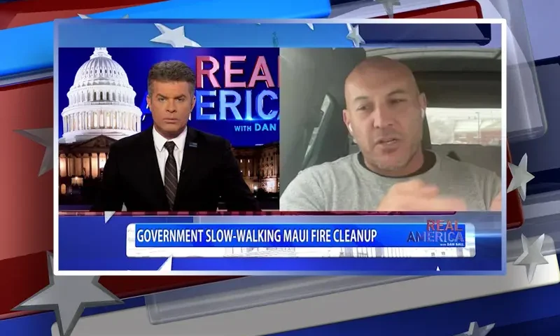 Video still from Real America on One America News Network showing a split screen of the host on the left side, and on the right side is the guest, Garrett Marrero.