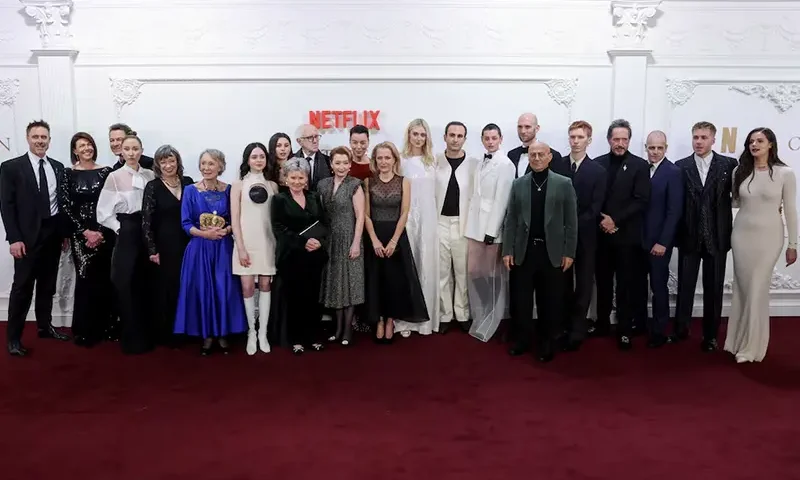 Cast members James Murray, Claudia Harrison, Dominic West, Erin Doherty, Marion Bailey, Marcia Warren, Viola Prettejohn, Beau Gadsdon, Jonathan Pryce, Imelda Staunton, Lesley Manville, Olivia Williams, Gillian Anderson, Elizabeth Debicki, Khalid Abdalla, Emma Corrin, Sebastian Blunt, Salim Daw, Luther Ford, Bertie Carvel, Jonny Lee Miller, Ed McVey and Meg Bellamy pose as they attend the premiere for the second part of Season 6 of the TV series "The Crown" in London, Britain, December 5, 2023. REUTERS/Isabel Infantes/File Photo