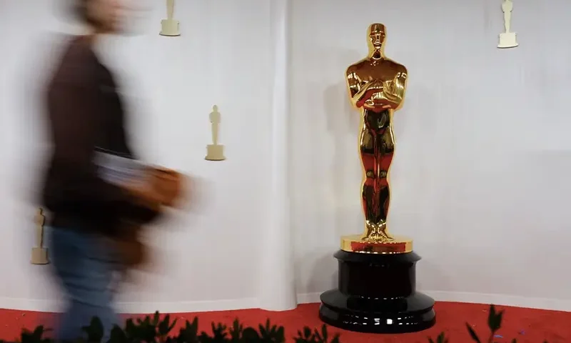 An Oscar statue is seen as preparations continue for the 96th Academy Awards in Los Angeles, California, U.S., March 9, 2024. REUTERS/Kevin Wurm