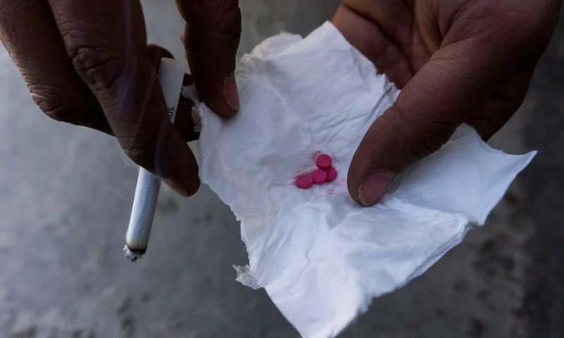 This photo taken on January 11, 2019 shows a drug user user holding low-grade crystal meth tablets, known in Southeast Asia as "yaba", in Muse, Shan State, along Myanmar's border with China. - Myanmar is the second-biggest producer of opium in the world after Afghanistan and is now believed to be the largest source of methamphetamine. (Photo by Ye Aung THU / AFP) / TO GO WITH Myanmar-health-drugs-opium-meth-conflict,FEATURE by Hla Hla Htay and Richard Sargent (Photo by YE AUNG THU/AFP via Getty Images)