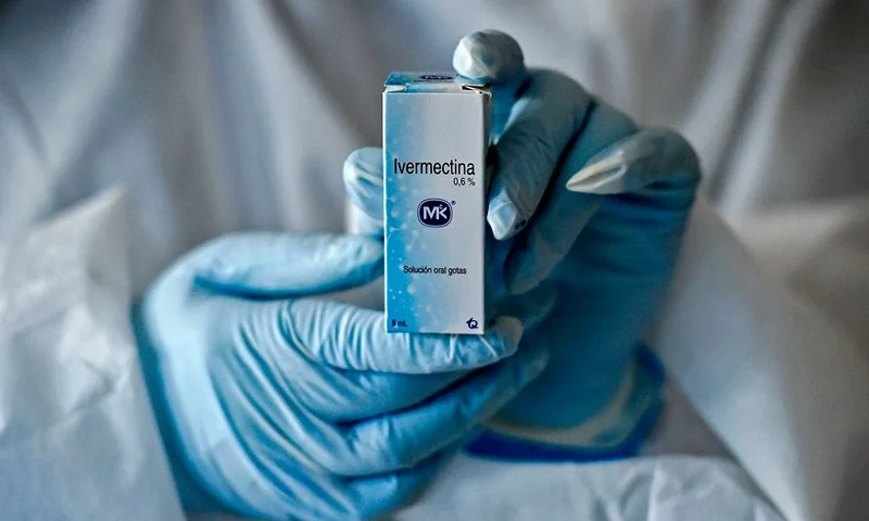 A health worker shows a box containing a bottle of Ivermectin, a medicine authorized by the National Institute for Food and Drug Surveillance (INVIMA) to treat patients with mild, asymptomatic or suspicious COVID-19, as part of a study of the Center for Paediatric Infectious Diseases Studies, in Cali, Colombia, on July 21, 2020. (Photo by Luis ROBAYO / AFP) (Photo by LUIS ROBAYO/AFP via Getty Images)