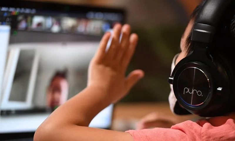 A student follows along remotely with their regular school teacher's online live lesson at STAR Eco Station Tutoring & Enrichment Center on September 10, 2020 in Culver City, California. - California public school students will continue to learn at home, in private learning pods, or at specialized enrichment centers like Star Eco Station as the coronavirus pandemic continues, after a lawsuit brought by the Orange County Board of Education seeking to compel the state to reopen public schools was shot down by the California Supreme Court on September 10. (Photo by Robyn Beck / AFP) (Photo by ROBYN BECK/AFP via Getty Images)