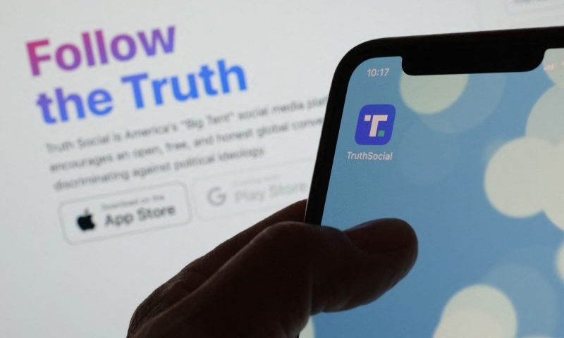 This illustration photo shows Donald Trump's new social media app Truth SocialÕs logo on a smartphone in Los Angeles, February 21, 2022. - Donald Trump's new social media app has started its gradual rollout but thousands of would-be users encountered glitches or found themselves placed on a waitlist Monday due to what the app called "massive demand." (Photo by Chris DELMAS / AFP) (Photo by CHRIS DELMAS/AFP via Getty Images)
