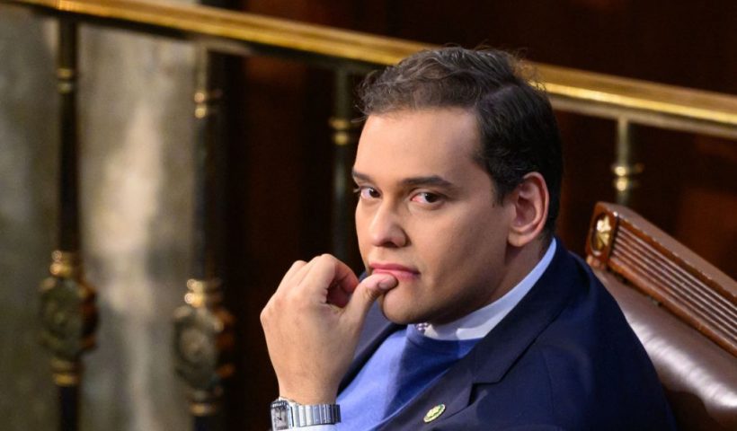 TOPSHOT - Newly elected Republican Representative from New York, George Santos looks on as the US House of Representatives convenes for the 118th Congress at the US Capitol in Washington, DC, January 3, 2023. - The new US Congress was thrown into chaos on its first day Tuesday as rebel right-wing Republicans moved to block party favorite Kevin McCarthy from becoming speaker of the House of Representatives. (Photo by Mandel NGAN / AFP) (Photo by MANDEL NGAN/AFP via Getty Images)
