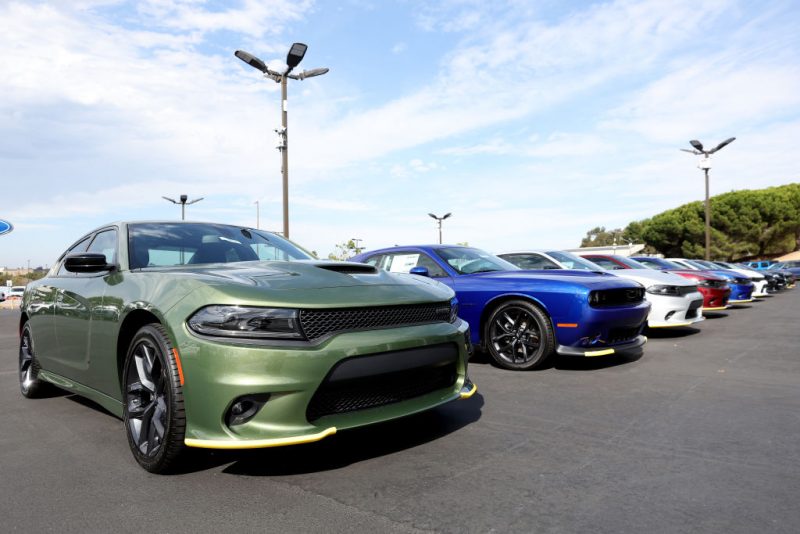 RICHMOND, CALIFORNIA - AUGUST 17: Brand new Dodge Charger cars are displayed on the sales lot at Hilltop Chrysler Jeep Dodge Ram on August 17, 2022 in Richmond, California. Dodge announced plans to discontinue their gas-powered Challenger and Charger muscle cars as they make the transition into electric vehicles. (Photo by Justin Sullivan/Getty Images)