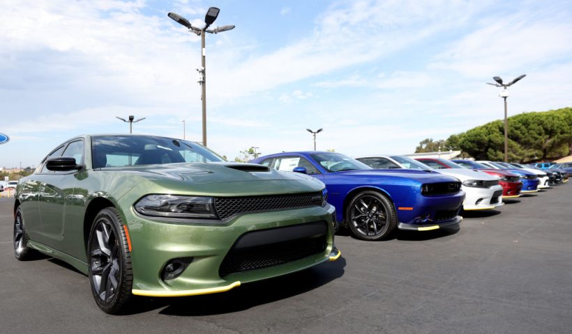 RICHMOND, CALIFORNIA - AUGUST 17: Brand new Dodge Charger cars are displayed on the sales lot at Hilltop Chrysler Jeep Dodge Ram on August 17, 2022 in Richmond, California. Dodge announced plans to discontinue their gas-powered Challenger and Charger muscle cars as they make the transition into electric vehicles. (Photo by Justin Sullivan/Getty Images)