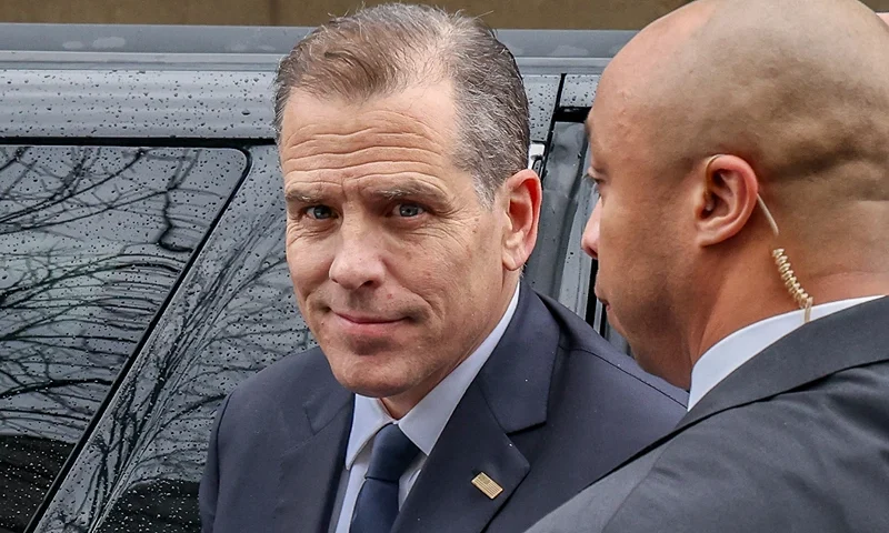 Congressional Integrity Project Sponsors Mobile Billboard And Poster Pasting Project In Washington, DC Calling On House Republicans To Drop The Impeachment Inquiry Of President Biden WASHINGTON, DC - FEBRUARY 28: Hunter Biden arrives at the Thomas P. O'Neil Jr. House Office Building for a closed door deposition on February 28, 2024 in Washington DC. A mobile billboard sponsored by the Congressional Integrity Project circled the building during the deposition. The mobile billboard is calling on House Republicans to drop the impeachment inquiry of President Biden after their star witness Alexander Smirnov was charged with lying to the FBI and accusing him of being a Russian intelligence asset. (Photo by Jemal Countess/Getty Images for Congressional Integrity Project)